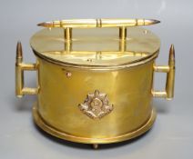 A WWI trench art biscuit barrel with applied Worcestershire regimental badge, the base dated 1918.