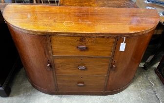 A Betty Joel Token furniture D shaped sideboard, the interior label dated January 1935, width 142cm,