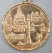 A 1970's 9ct gold 'London Town' medallion, 8.5 grams.