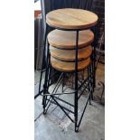 A set of four industrial style wrought iron and oak bar stools, height 70cm