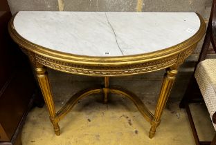 A Louis XVI style carved giltwood marble top D shaped console table, width 110cm, depth 50cm, height