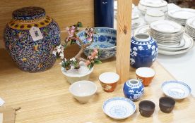 A group of various Chinese ceramics, to include a blue and white prunus jar, an earthenware dish,
