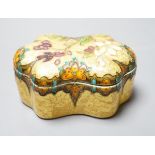 A Clement Massier, Golfe Juan box with enamelled floral decoration on ground yellow base, 9.5cm,