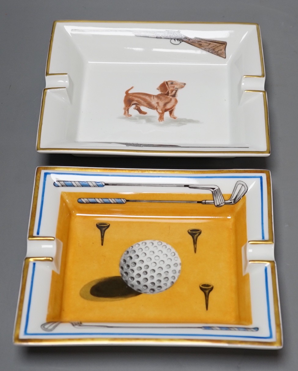 Two Hermes, Paris porcelain ashtrays: one golfing related (boxed), the other hunting related,golf