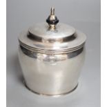 A 20th century continental white metal circular pot and cover, with pseudo marks, height 13cm, gross