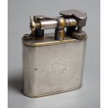 A vintage 1930’s Dunhill Unique Sports plated nickel cigarette lighter.