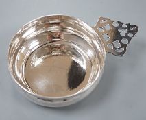 A modern Brittania standard silver bleeding bowl, by Tessiers Ltd, with pierced handle, diameter