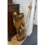 A carved wood figure of a gate keeper, height 110cm