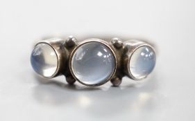 A Georg Jensen sterling 925 and three stone cabochon moonstone set half hoop ring, no. 3, size M/