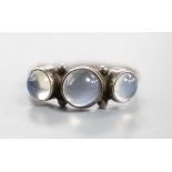 A Georg Jensen sterling 925 and three stone cabochon moonstone set half hoop ring, no. 3, size M/