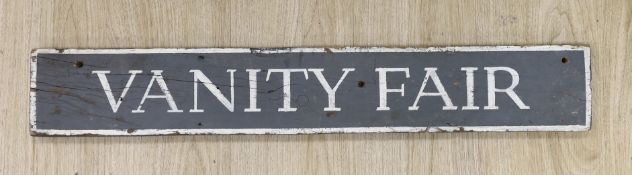 A painted 'Vanity Fair' sign 12.5x80cm