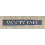 A painted 'Vanity Fair' sign 12.5x80cm