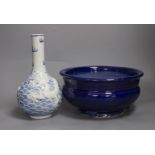 A Chinese blue and white ‘dragon’ bottle vase and a large blue glazed censer, diameter 23cm