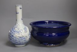 A Chinese blue and white ‘dragon’ bottle vase and a large blue glazed censer, diameter 23cm
