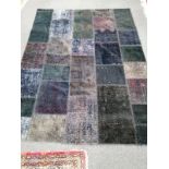 A multi coloured rug, 199 x 150cm