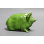 A Wemyss ware pig, decorated in lime green glaze and impressed to the base Wemyss ware RH & S, for