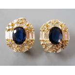 A pair of modern 750 yellow metal, sapphire and diamond set oval cluster earrings, 16mm, gross