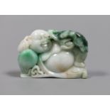 A Chinese jadeite Budai reclining figure, 6 cms wide,