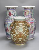 A pair of Chinese famille rose baluster vases and a bulbous brown glazed vase, all a.f, pair of