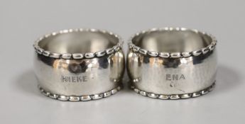 A pair of Georg Jensen sterling napkin rings, numbered 30D, 54mm.