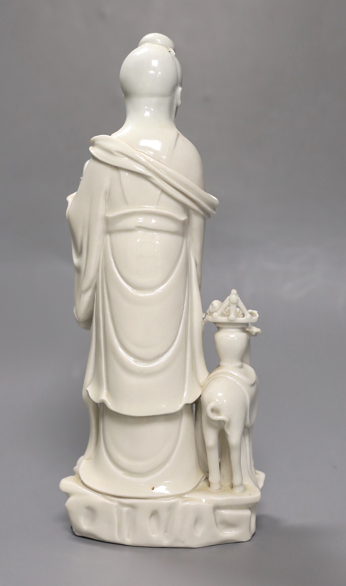A Chinese Dehua blanc-de chine Guanyin group, late 19th/early 20th century, seal mark to back, 27cm - Image 2 of 4