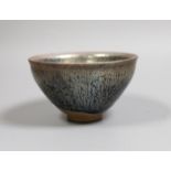 A Chinese hare's fur terracotta bowl, 7 cms high,