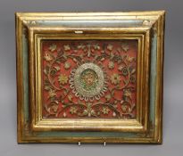 An 18th century century Italian scrolled paper and metal thread picture, in a polychrome and gilt