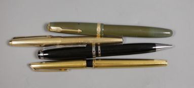 A Montblanc ballpoint pen, a Parker Duofold fountain pen, a C F Waterman and another rolled gold