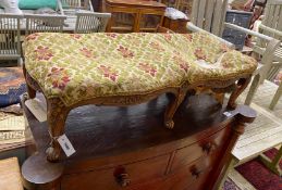 A 19th century French carved beech serpentine footstool, length 108cm