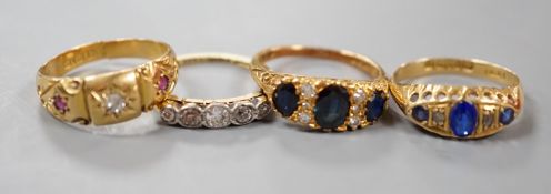 Three early 20th century 18ct and gem set half hoop rings, including ruby and diamond chip, five