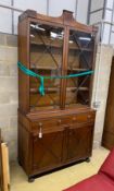 A Regency mahogany library bookcase, width 131cm, height 261cm