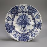 A mid 18th century Delft blue and white ‘flower urn’ dish, Claw Factory, 31cm