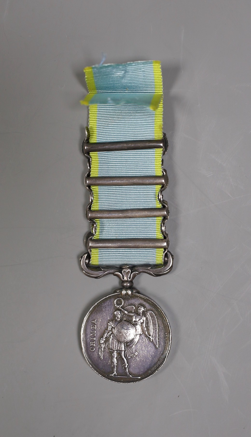 A Crimea war medal with 4 clasps - ‘Sebastopol’, ‘Inkermann’, ‘Balaklava’ and ‘Alma’ stamped 3722 - Image 2 of 2