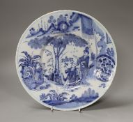 A Frankfurt delft or fayence blue and white chinoiserie dish, c.1720, 29cm