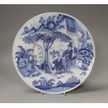 A Frankfurt delft or fayence blue and white chinoiserie dish, c.1720, 29cm