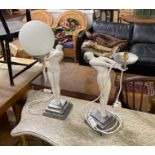 A pair of Art Deco style resin figural lights (lacking one globe), height 55cm