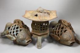 A Japanese iron lantern and two similar koi
