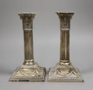 A pair of Edwardian silver Corinthian column candlesticks, Henry Wigful, Sheffield, 1904, height
