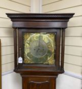 Benjamin Booth of Pontefract A George III oak cased 8-day brass and silver face longcase clock,