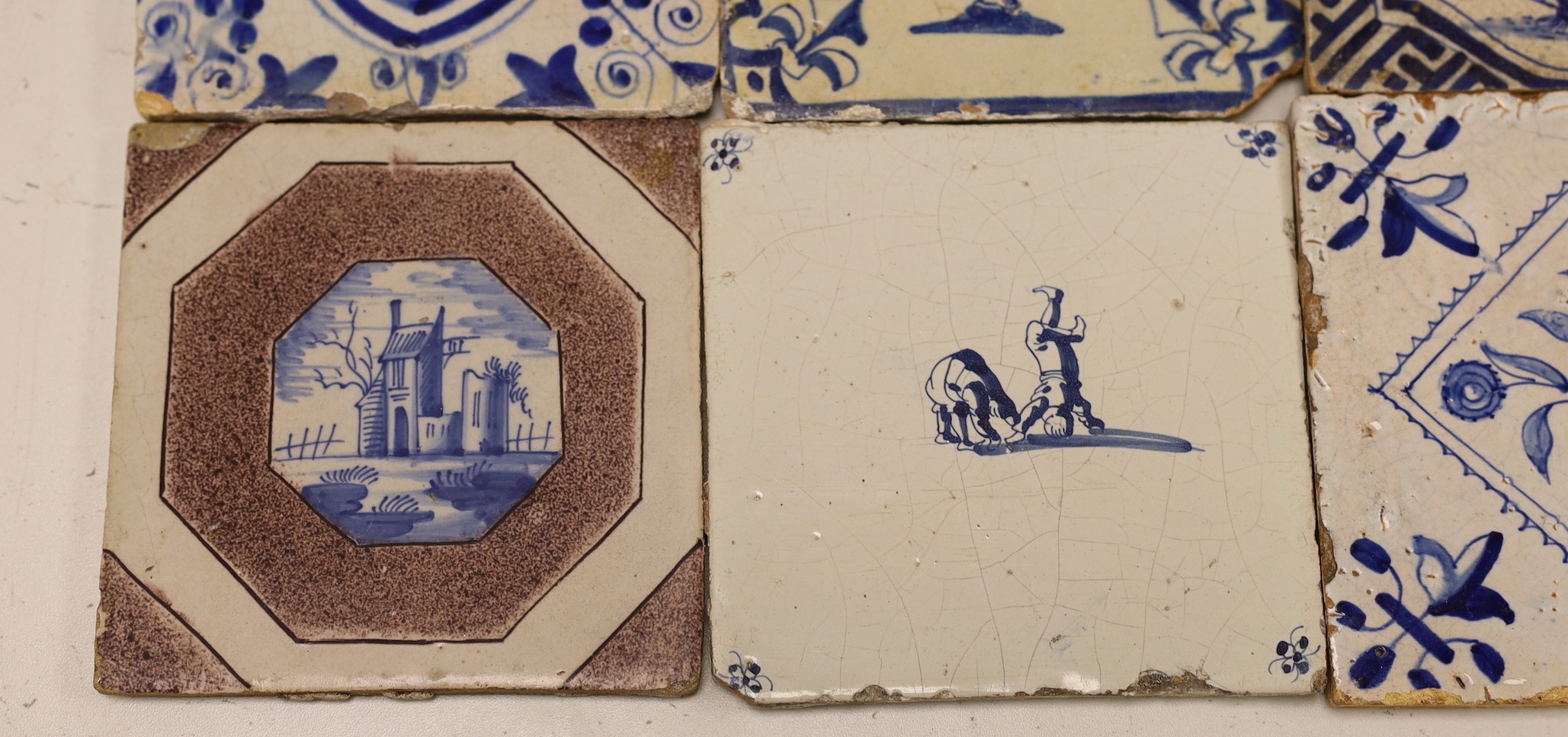 Four mid 17th century Delft blue and white ‘urn of flowers’ tiles, and an 18th century Delft ‘ - Image 2 of 6