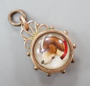 A late Victorian 9ct gold mounted Essex crystal and compass set fob, 25mm, the crystal decorated