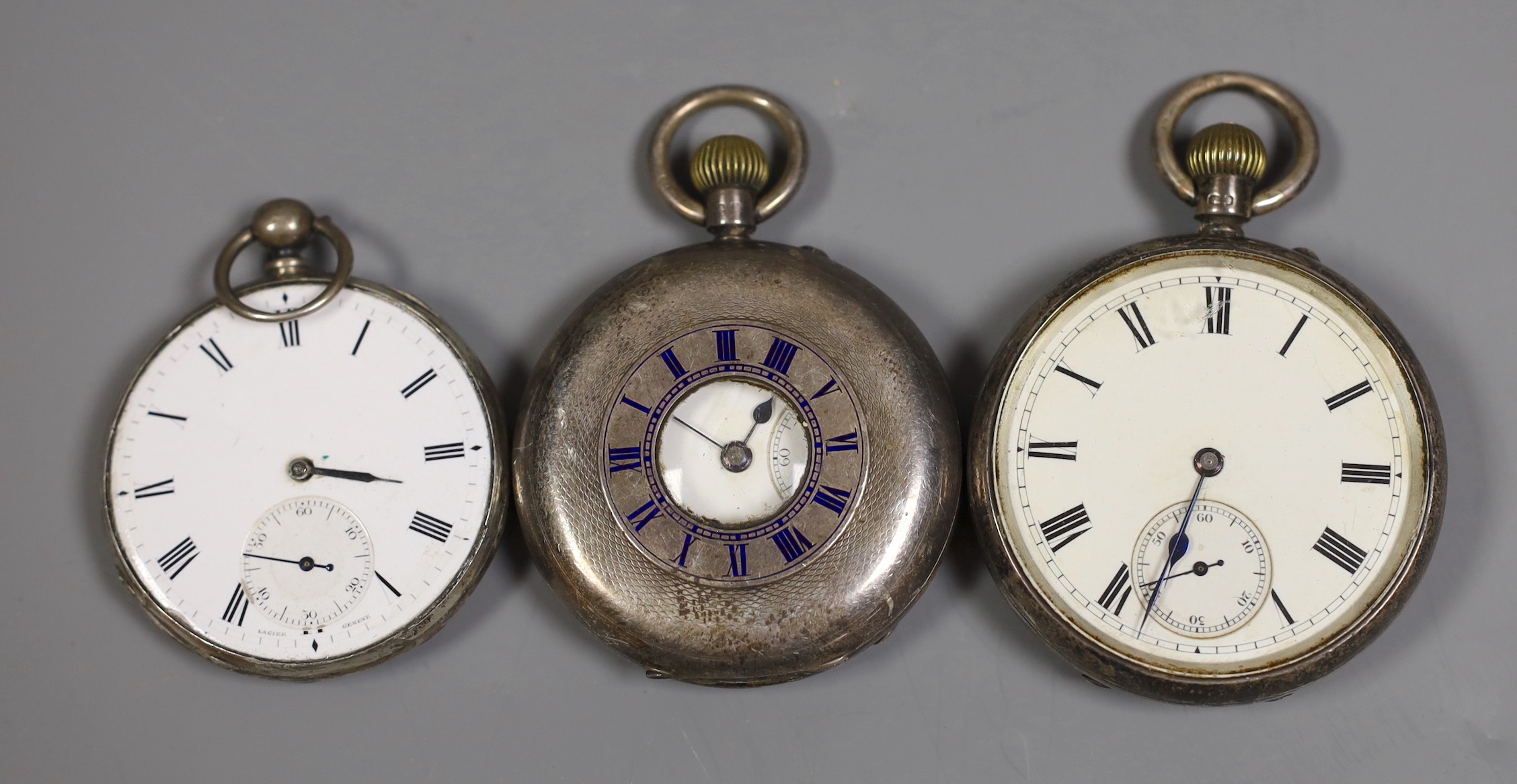 Two silver pocket watches including half hunter and one other white metal open faced pocket watch(