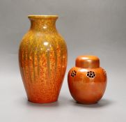 A Pilkington‘s Royal Lancastrian mottled orange ground vase and a Ruskin Orange lustre jar and
