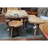 A George I style mahogany tapestry top dressing stool and three rustic stools