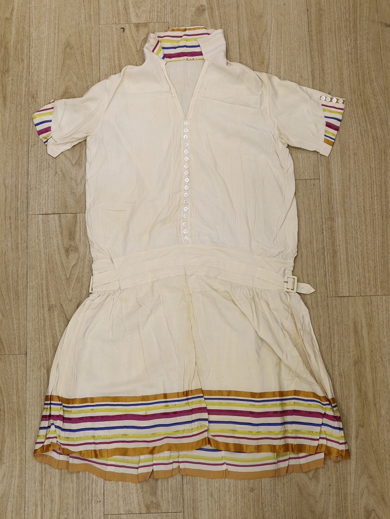 A 1920's cream silk tennis dress with multicoloured stripe collar, cuff and hem detail, together - Image 2 of 5