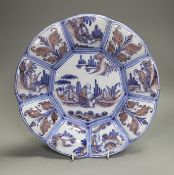 A Delft manganese and blue kraak style dish, c.1700, 30cm