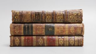 An 18th century leather bound book safe, formed of three leather bound volumes9 cms high x 17 wide,