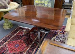A Regency rectangular mahogany snap top breakfast table on brass casters, width 128cm depth 109cm