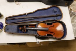 A 3/4 size violin, length of back 33cm, wooden case
