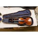 A 3/4 size violin, length of back 33cm, wooden case